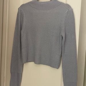 Vestique high-neck sweater.